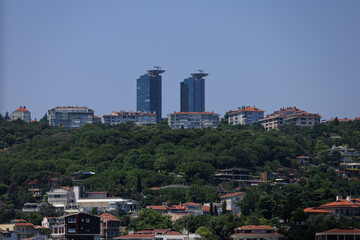 Cityscape, view of buildings and houses with green plants in public places in Turkey, sunny summer...
