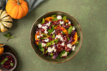 Autumn salad of baked pumpkin, chorizo and mozzarella. The concept of healthy eating.