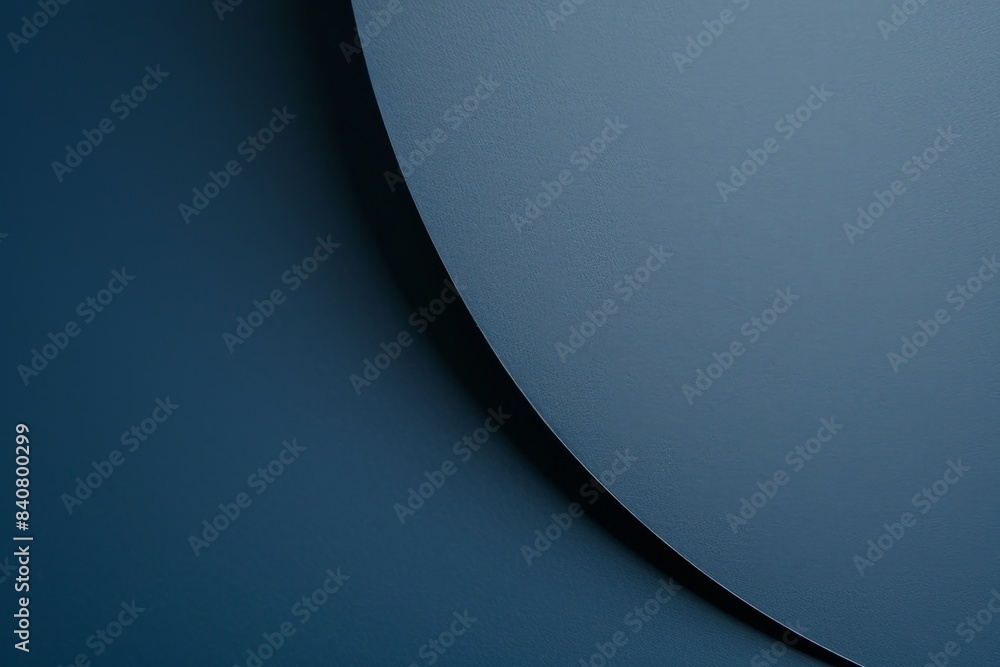 Poster sheet of blue paper is gently curved, creating a soft shadow and a sense of depth, perfect for a min