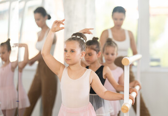 Group of ballerinas preparing for performance, learning and improving quality of rendering stage....