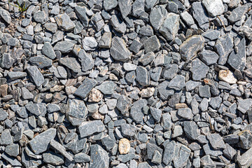 Looking down at a full frmae photograph of slate chippings