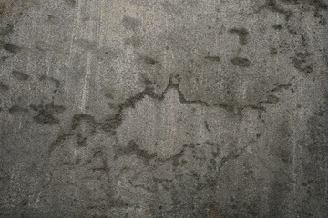 Damaged cement concrete wall texture background, rusty uneven cement wall surface, Grungy abstract wall backdrop