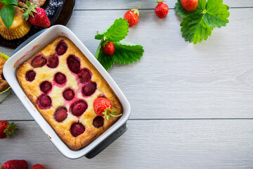 Sweet cottage cheese casserole with strawberry filling