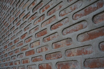 Seamless brick layers pattern wall background, Red uneven break texture backdrop, Artistic 3d layered brick pattern surface