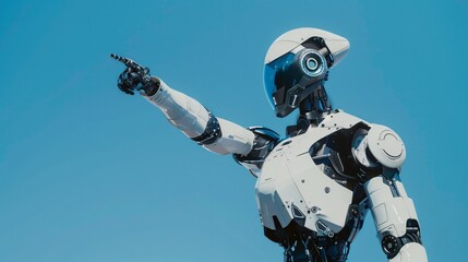 Close up shot of an android robot with left hand raised up standing against blue background, pointing to left side. High technology concept