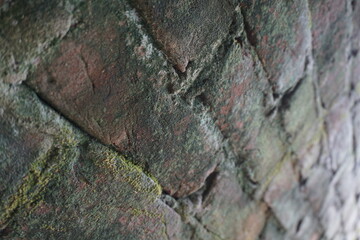 Abandoned mossy brick layered wall background, Grungy brick wall texture background, Weathered rusty brick backdrop