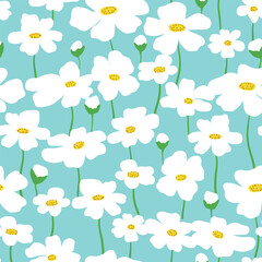 Seamless pattern with chamomile flowers on blue background.