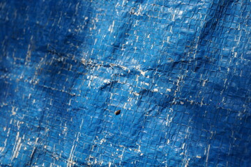 Blue grungy background with light shade, Rustic uneven material backdrop design, stripped particle...