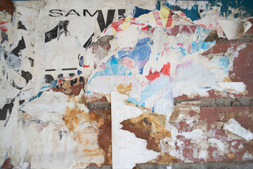 Naklejka premium Torn and weathered street poster background, abstract paper collage backdrop
