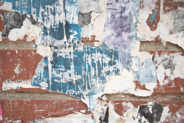 Torn and weathered street poster background, abstract paper collage backdrop