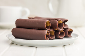 Chocolate Covered Wafers on White Plate