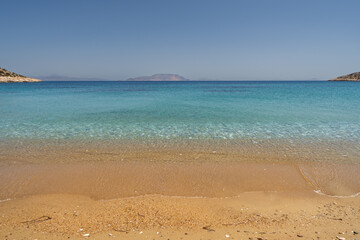 View of the amazing sandy and turquoise beach of Agia Theodoti in Ios Greece