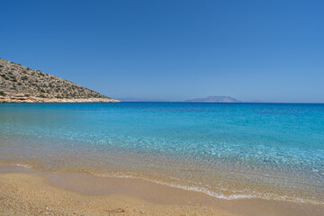 View of the amazing sandy and turquoise beach of Agia Theodoti in Ios Greece