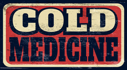 Fototapeta premium Aged and worn cold medicine sign on wood