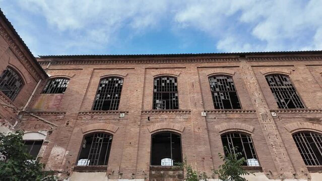 slow motion of large abandoned factory

