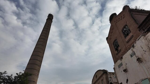 slow motion of large abandoned factory

