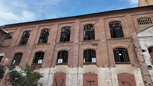 slow motion of large abandoned factory
