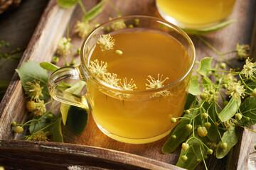 Linden flower tea in a glass cup