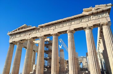 Fototapeta premium Photo of the majestic Parthenon temple at the top of the Acropolis hill in Athens, Greece.