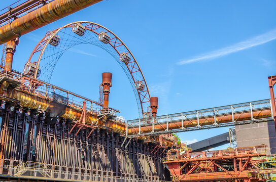 Metal constructions in industrial park - Powered by Adobe