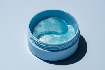 cosmetic hydrogel patches for moisturizing and nourishing the skin around the eyes. Blue...