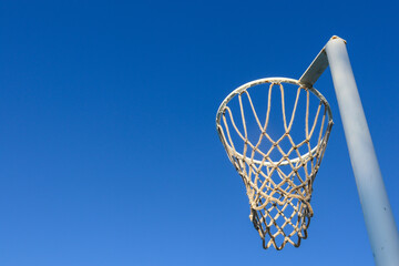 netball hoop against blue sky