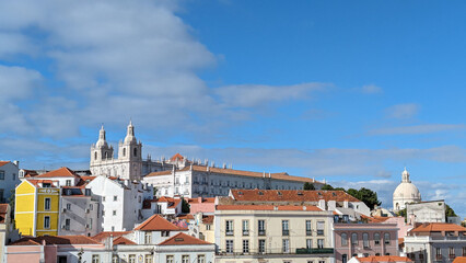Fototapeta premium beautiful cityscape, white houses warmed by the summer sun