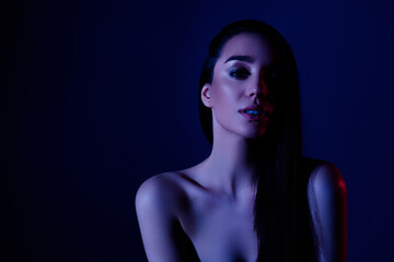Fototapeta premium Photo of attractive girl lady feel tempting look isolated dark neon color background