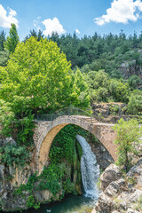 Fototapeta premium Clandras Köprüsü is an ancient bridge in Turkey, the one arch bridge was constructed during the Phrygian era of Anatolia. Arch structures were introduced during the Roman period in Uşak.