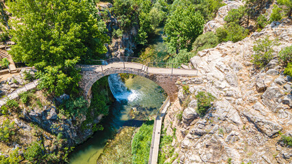 Clandras K&ouml;pr&uuml;s&uuml;  is an ancient bridge in Turkey, the one arch bridge was constructed during the Phrygian era of Anatolia. Arch structures were introduced during  the Roman period in Uşak.