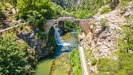 Clandras K&ouml;pr&uuml;s&uuml;  is an ancient bridge in Turkey, the one arch bridge was constructed during the Phrygian era of Anatolia. Arch structures were introduced during  the Roman period in Uşak.