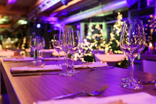 Table set for a Christmas party with wine glasses and Christmas decorations, Cologne, North Rhine-Westphalia, Germany, Europe