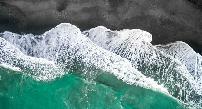 Waves on the beach, turquoise sea and black sand beach, aerial view, west coast, south island, New Zealand, Oceania