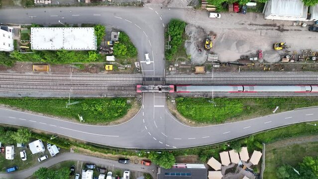Aerial view of freight train passing along a valley
