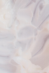 close up of white lotion, cream, body butter