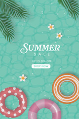Swimming Pool Background with swim rings and palm leaves
