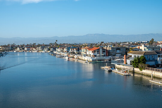 scenic view to old  houses at beach promenade and artifical channal of Ventura, USA.
