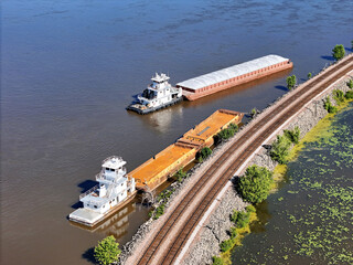 Aerial view of a Barge being docked  at the shore of the Mississippi River