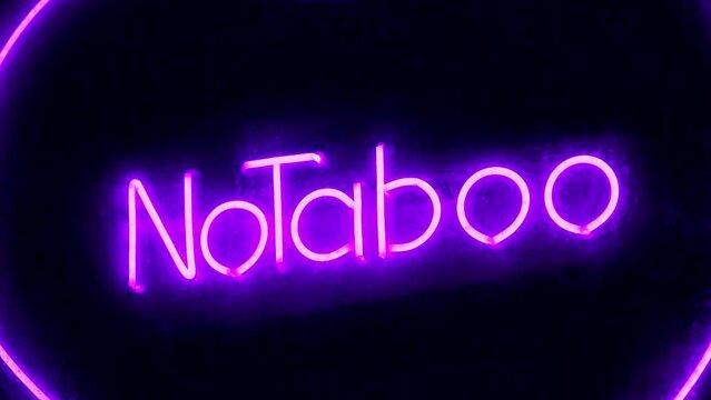 No Taboo inscription in violet color at sex shop window. Peccability and moral degradation of society, decline in morals, zoom-in video