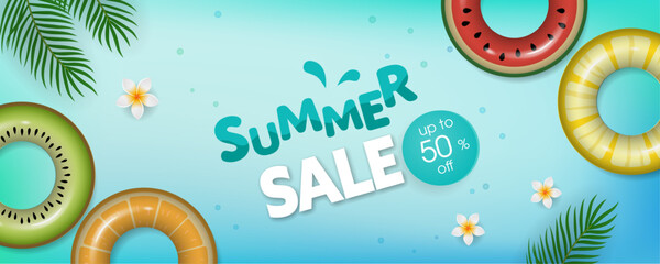 Summer Sale banner with swim rings, palm leaves and flowers