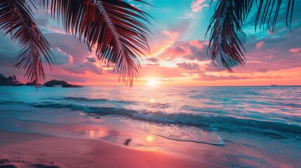 Panoramic sunset view of the beautiful coast, with turquoise sea next to fine sandy beaches and palm trees