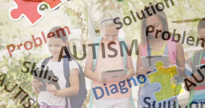Image of autism text over kids friends using electronic devices