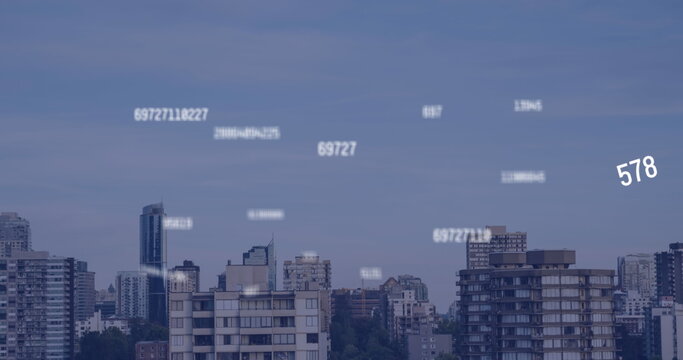 Image of falling numbers over cityscape