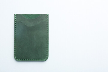 Empty leather card holder on light grey background, top view. Space for text
