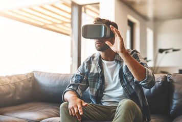 Creative, man and virtual reality headset in home lounge of cyber experience, metaverse system or gaming connection. .Gamer, VR or games in living room with future, innovation and ui technology