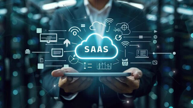 Business concept. Internet and networking technology. SaaS (software as a service). Businessman show virtual screen of SaaS icons for software services on cloud system. Strategic business success 