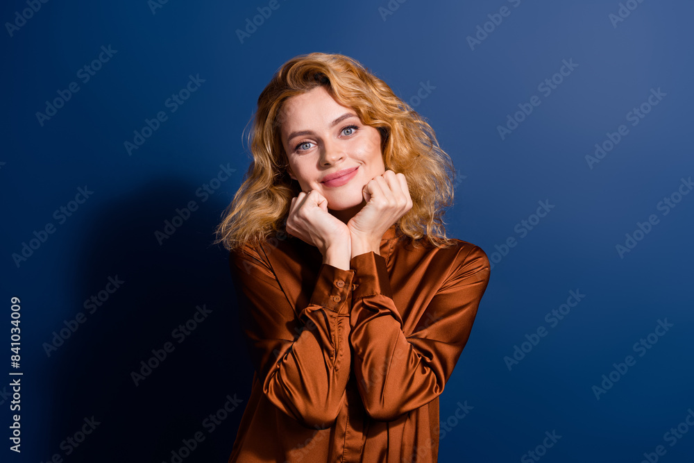 Wall mural portrait of lovely cute dreamy girl with curly hairdo wear silk blouse holding arms on chekbones iso