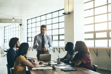 Laptop, leader or businessman in presentation for solution, problem solving or teaching in meeting. Manager, staff workshop or mentor talking in team training, coaching class or learning opportunity