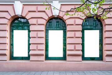 Mock-up Of Three Showcase Poster Billboards On Pink Building Facade. Front View