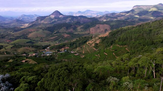 Flying Along Mountains with vst Rainforest and Coffee Farms in Brazil, Aerial